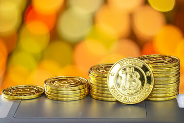 The golden bitcoins and reflections.