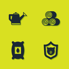 Set Watering can, Shield with pig, Pack full of seeds of plant and Roll hay icon. Vector © vector_v