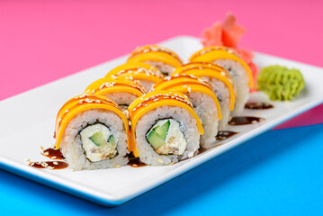 Sushi rolls philadelphia or california with cheddar and creame cheese, with tuna and avocado.