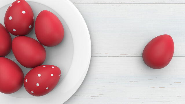 Red Easter eggs on white plate with white polka dots. Wooden table with plate and red eggs. 