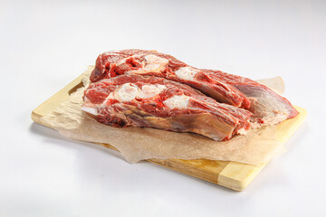 Raw bones for cooking over board