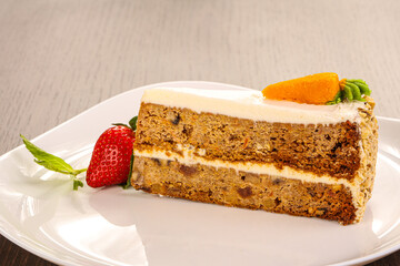 Carrot cake slice with cream