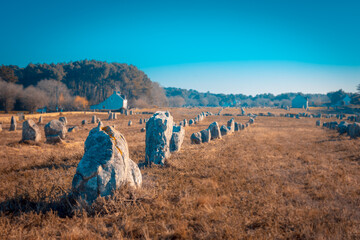 Menhirs of Carnac in Brittany by a winter morning light