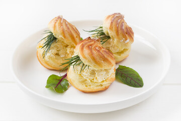 Profiterole staffed  with cheese salad. Cheese profiteroles, profiterole buffet