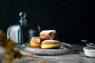 berliner and other objects on a black background