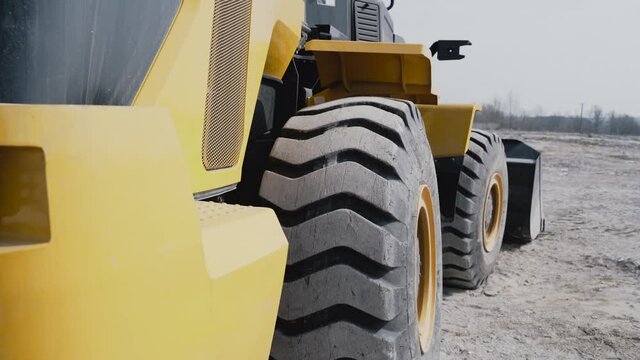 Close up of heavy-duty, off-the-road, all terrain tires for heavy industrial machinery. 
