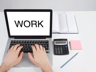 a man sitting at a desk and working at a computer with his hands,  Office desktop on a white background.