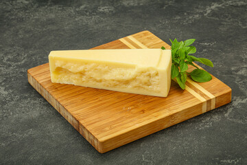 Hard parmesan cheese served basil