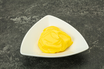 Natural cheese sauce in the bowl