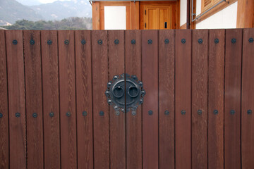 The gate of a hanok with a handle. in Seoul, South Korea. Feb. 9, 2021