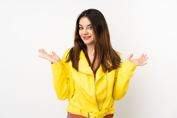 Young caucasian woman isolated on white background with shocked facial expression