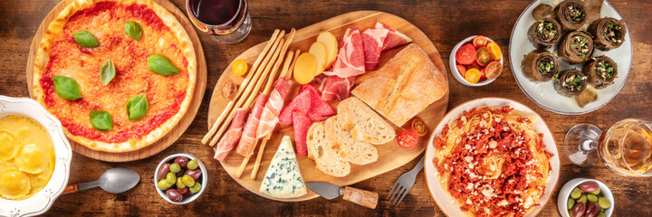 Italian food panorama with pizza, antipasti, pasta, artichokes, tomatoes, etc