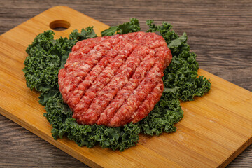 Raw beef burger cutlet for cooking