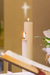Easter candle welcomes the light of the holy spirit