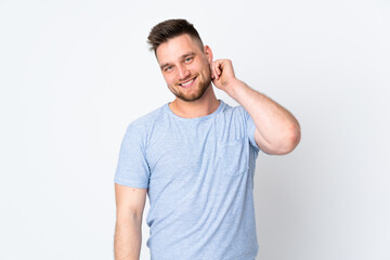 Fototapeta premium Russian handsome man over isolated background laughing