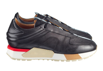 Pair of elegant men's sneakers made of genuine leather in the color of gray asphalt, with a sole...