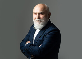 Smiling caucasian man portrait of person in studio. Old Man. Happy senior male model.