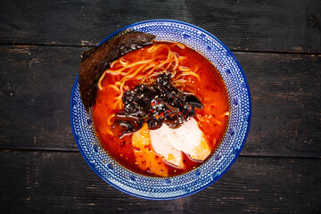 Japanese spicy chili miso ramen noodle soup bowl in a traditional bowl