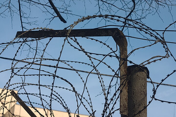 barbed wire fencing around the protected object