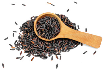 Pile of Brown Rice in a wooden spoon isolated. Organic black rice isolated on white background.