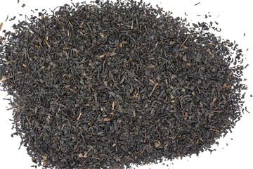 Dry black tea leaves isolated on white background.