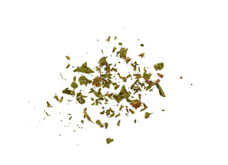 Dried lemon balm pile isolated on white background. Lemon balm spice. Bio organic lemon balm tea.