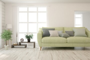 Minimalist living room in white color with sofa and summer landscape in window. Scandinavian interior design. 3D illustration