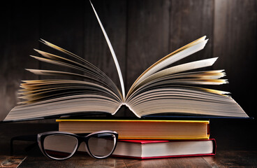 Composition with open book on the table