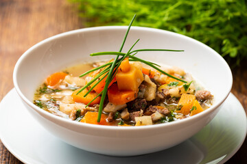 Beef stew with potatoes, carrots and herbs