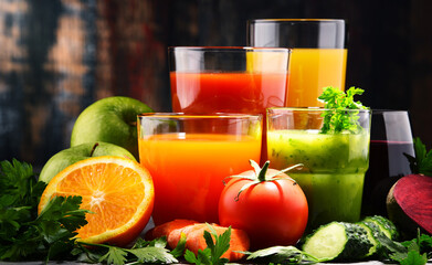 Glasses with fresh organic vegetable and fruit juices