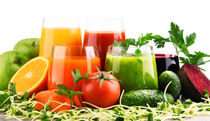 Glasses with fresh organic vegetable and fruit juices