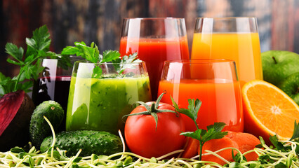 Glasses with fresh organic vegetable and fruit juices