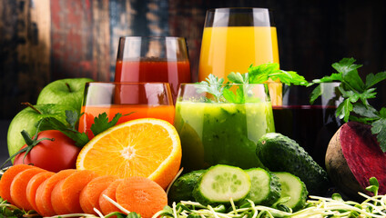 Glasses with fresh organic vegetable and fruit juices