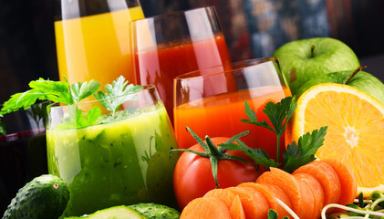 Glasses with fresh organic vegetable and fruit juices