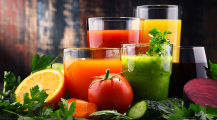 Glasses with fresh organic vegetable and fruit juices