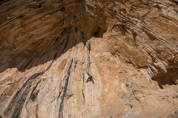 The girl climber climbs.