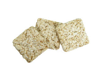 Puffed rice cakes isolated on white. Stack of puffed whole grain crispbread isolated on white.