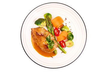 Roasted chicken breast with vegetables. Healthy food, isolated on white background. High resolution image