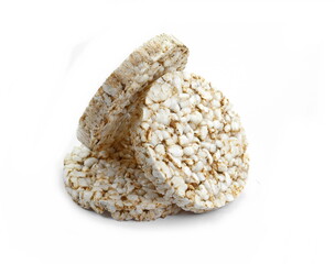 Puffed rice cakes isolated on white. Stack of puffed whole grain crispbread isolated on white.