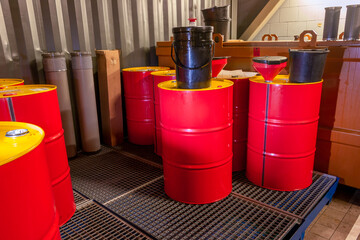Industrial storage of oil barrels in a factory space, specially equipped for chemical waste, the...