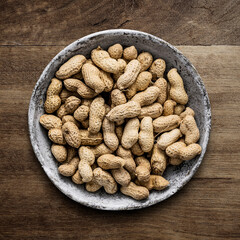 Peanuts flat lay on wooden table