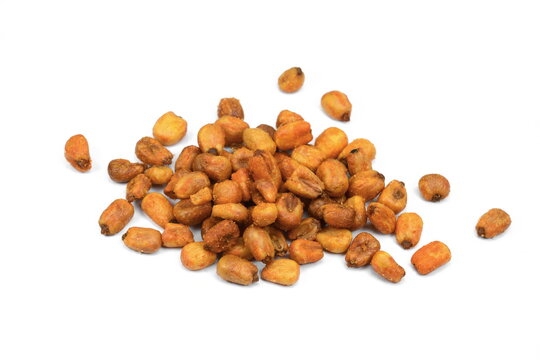 Pile of toasted salted corn on a white background. Salted roasted corn with chili pepper.