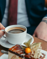 person holding a cup of coffee
