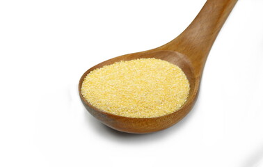 Polenta or corn flour isolated on white. heap of cornmeal isolated on white background. Corn grits. 