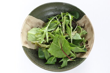 Baby leaves salad with copy space for healthy food ingredient