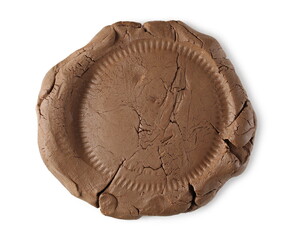 Brown modelling clay circle, isolated on white background, top view