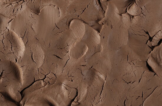 Brown modelling clay background and texture