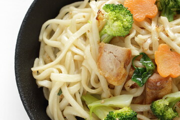 Chinese food, flour noodles and vegetable stir fried with chicken