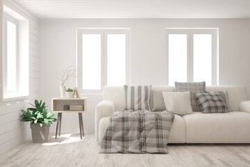 Fototapeta premium White living room with sofa. Scandinavian interior design. 3D illustration