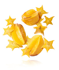 Fototapeta premium Creative image with fresh yellow carambola falling in the air